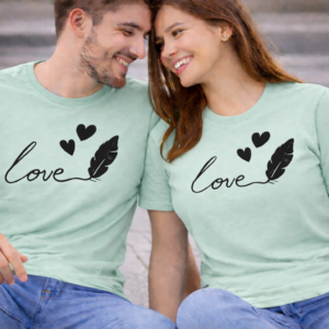 Couple wearing mint green matching love T-shirts with heart and feather design