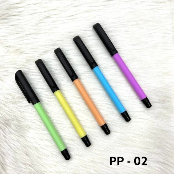 Pastel color plastic ball pens with black caps arranged