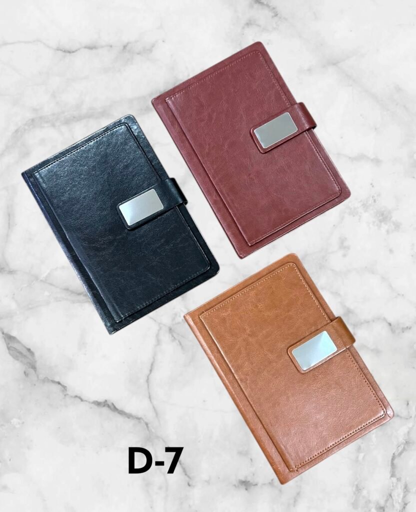 Premium leather finish strap lock corporate notebook with metal logo plate available in navy blue, burgundy and tan for branding in Ahmedabad